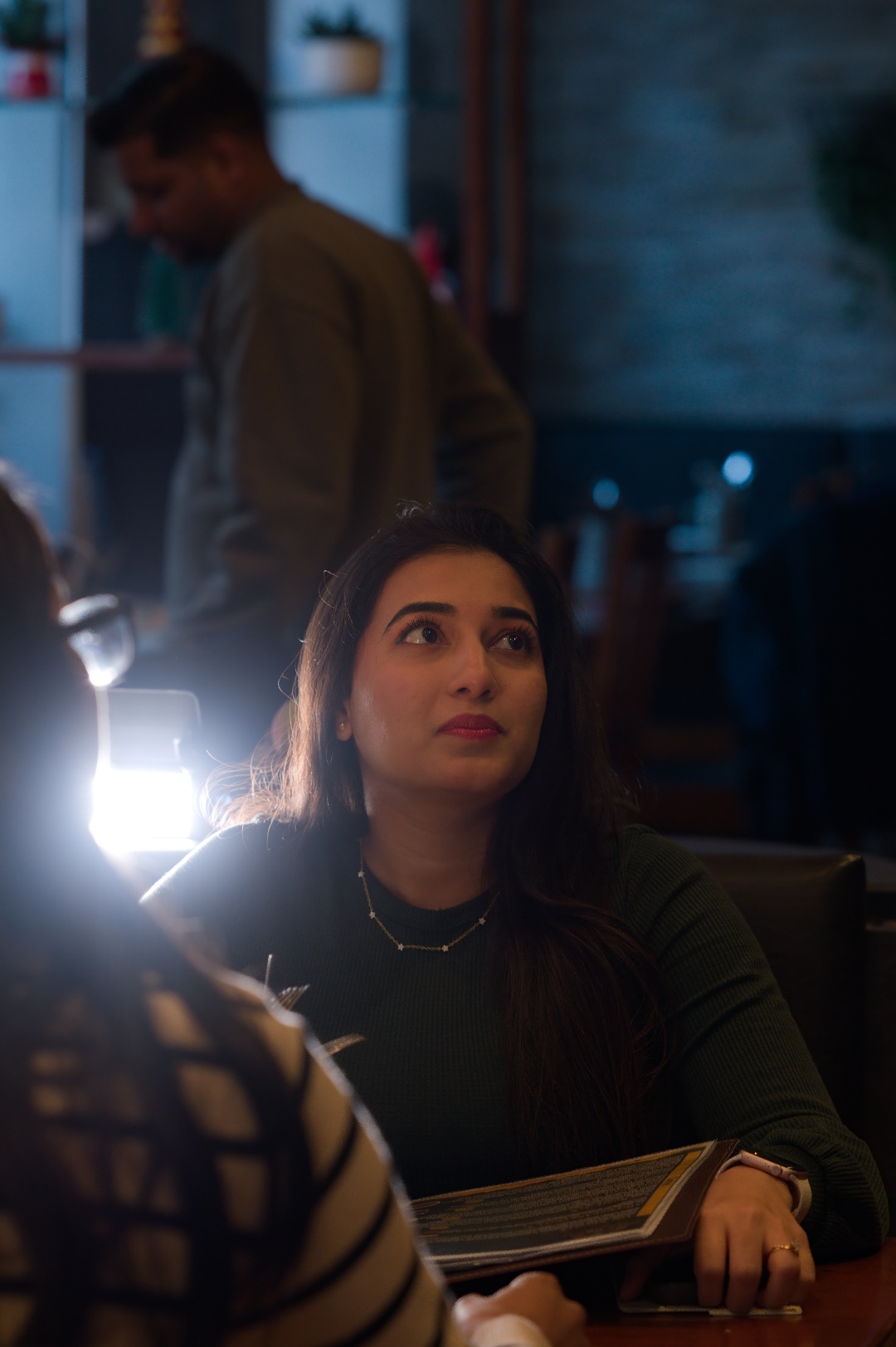 Customer enjoying dining experience at The Spice Route Kerala restaurant Munich Germany